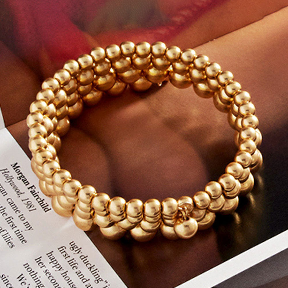 Madeline Love Worn Gold Metal Ball Cluster Coil Bracelet - Bracelets