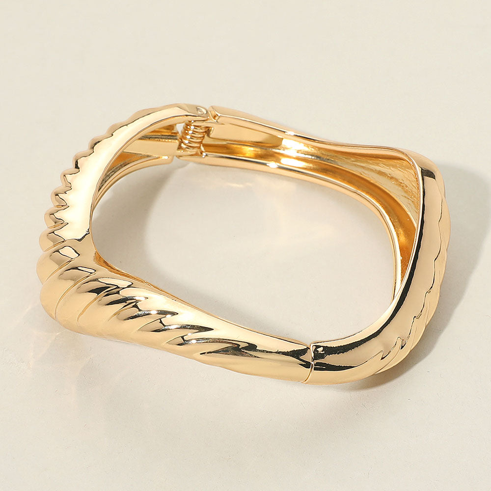 Madeline Love Gold Textured Metal Sculptural Hinged Bangle Bracelet - Bracelets