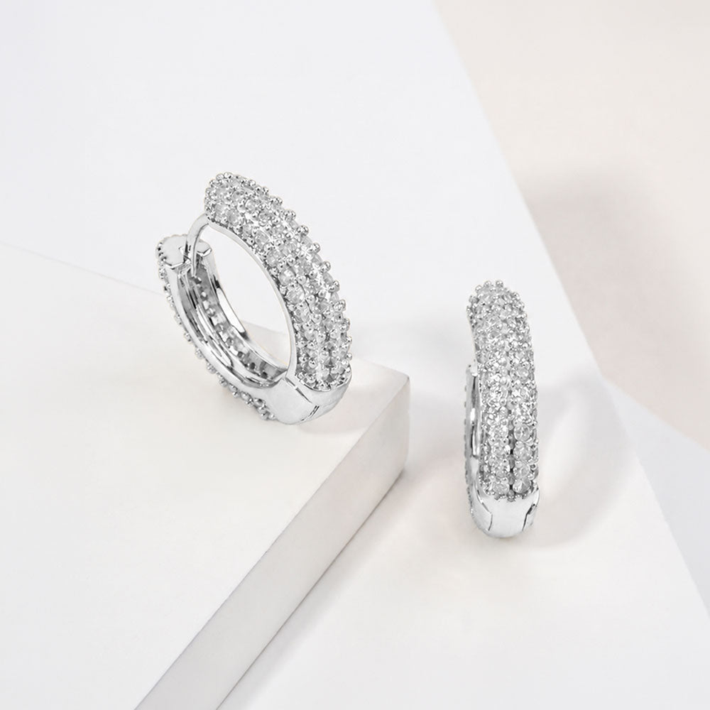 Madeline Love Clear, Rhodium 14K Gold Dipped Triple Row CZ Pave Huggie Hoop Earrings