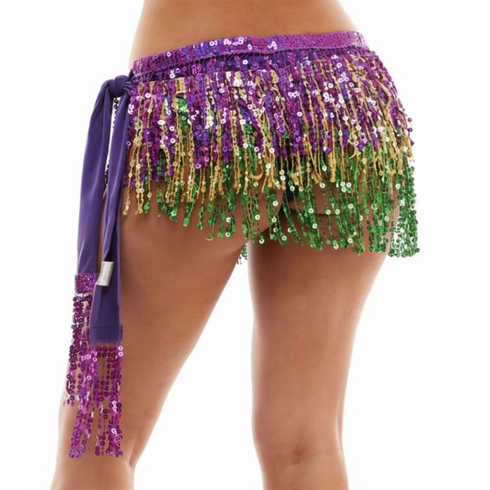 Multi Statement hip scarf skirt featuring layered fringe and shimmering movement that elevates dance, festival, and costume looks. Designed to tie easily at the waist for a flexible fit, it adds eye-catching texture and dynamic motion, making it a standout accessory for performance styling, themed events, and bold boutique collections.