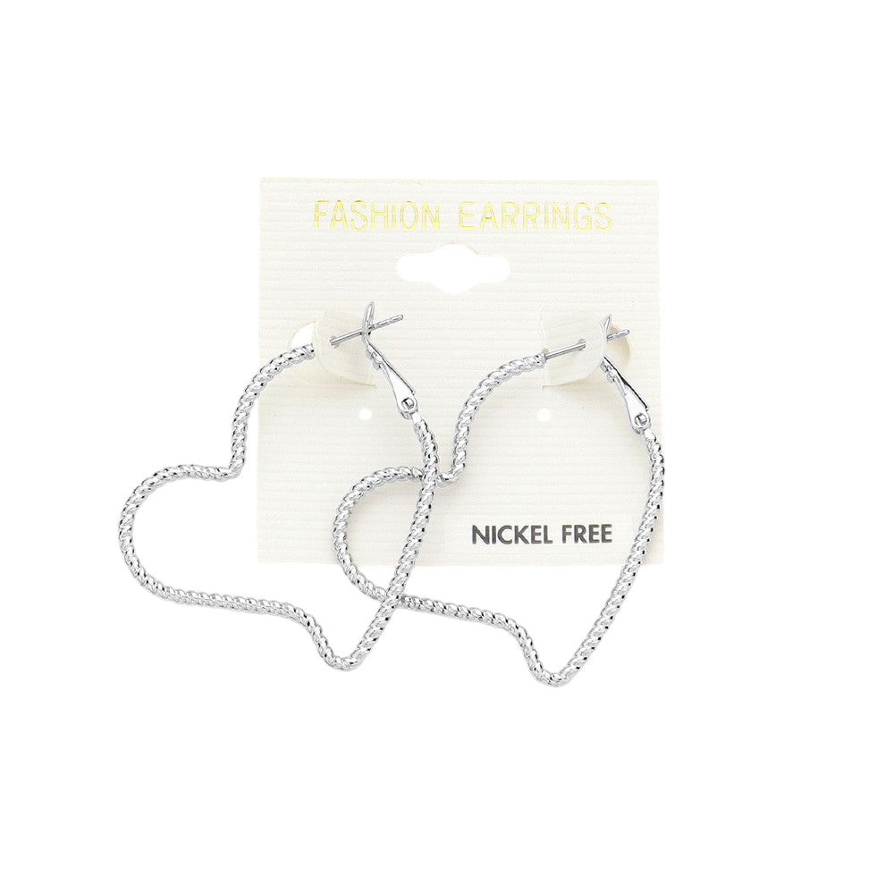 Metal Heart Hoop Earrings are a stylish addition to any outfit. Made of a durable metal, they are solid and long-lasting. With their heart-shaped design, they add a touch of romance to any look. Perfect for a date night or a day at the office.