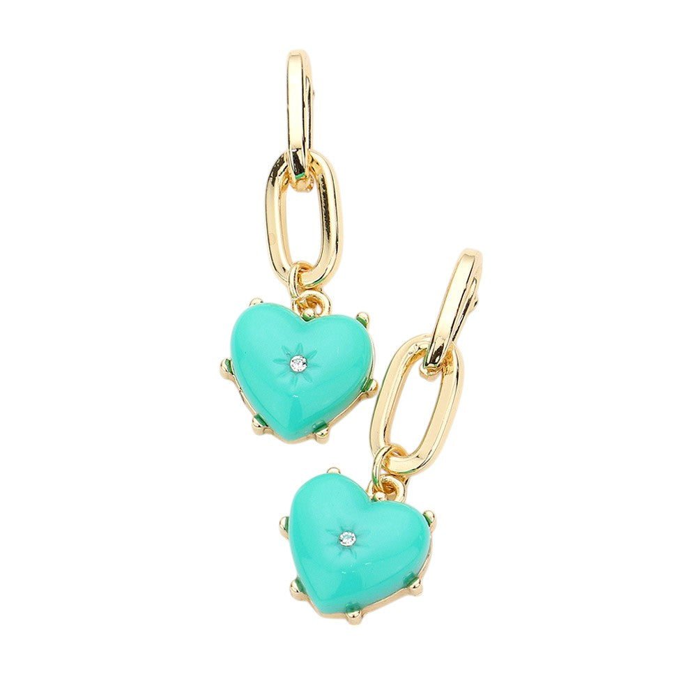 Mint Rhinestone Centred Resin Heart Dangle Earrings - the perfect combination of elegance and charm. These earrings feature a dazzling rhinestone centred on a heart-shaped resin pendant, adding a touch of sparkle to any outfit. Expertly crafted with high-quality materials, our earrings are sure to make a statement.