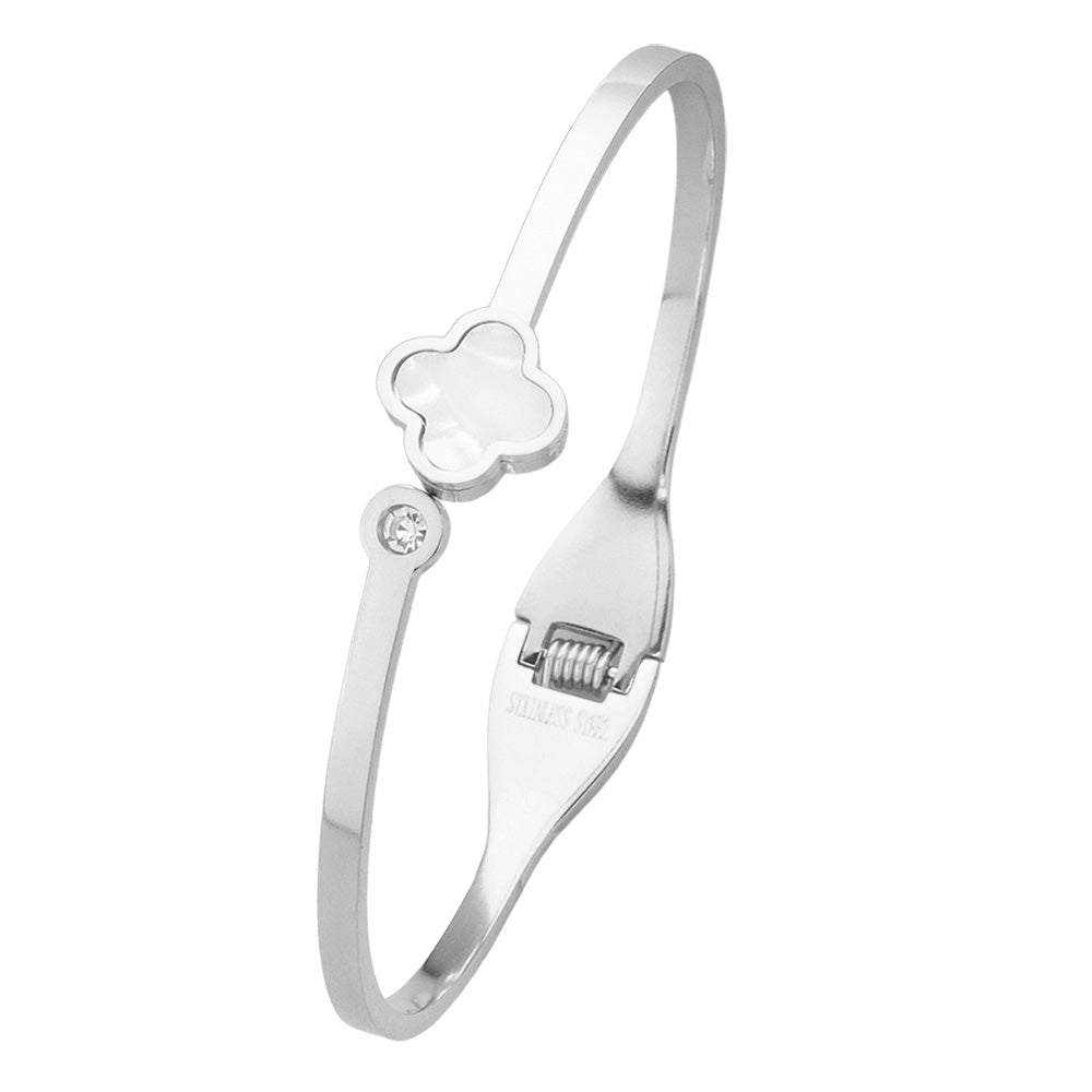 Mother Of Pearl Quatrefoil Pointed Stainless Steel Hinged Bangle Bracelet is a stylish and durable accessory for everyday wear. Made of high-quality stainless steel, it features an intricate quatrefoil design and a hinged closure for a secure fit. Upgrade your look with this versatile and timeless piece.