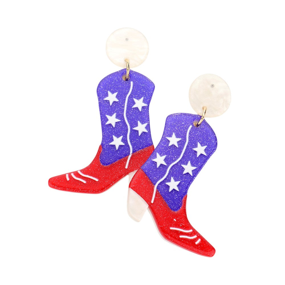 Multi American USA Flag Glittered Western Boots Dangle Earrings combine patriotic symbolism with Western aesthetics. The miniature boot design features precision-applied glitter in the American flag's classic red, white, and blue pattern. Expertly balanced for comfortable wear, these statement pieces complement both casual denim looks and evening attire. The dangling style creates subtle movement, drawing attention to the face while showcasing your national pride.