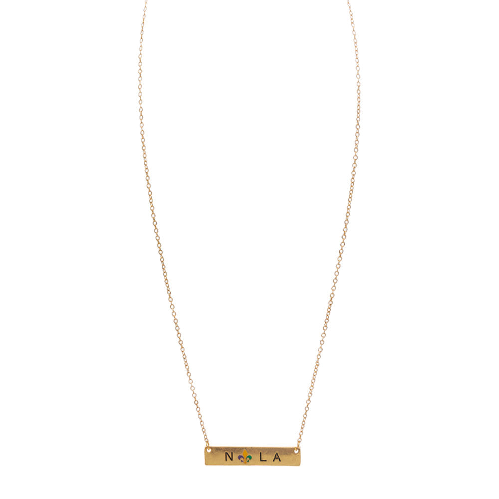 Multi Mardi Gras Fleur de Lis Pointed Nola Message Pendant Necklace, is perfect for Mardi Gras events. Made from durable material, this necklace features a colorful Fleur de Lis pendant with a Nola message. Show off your festive spirit in style with this eye-catching necklace. A perfect festive gift for family and friends.
