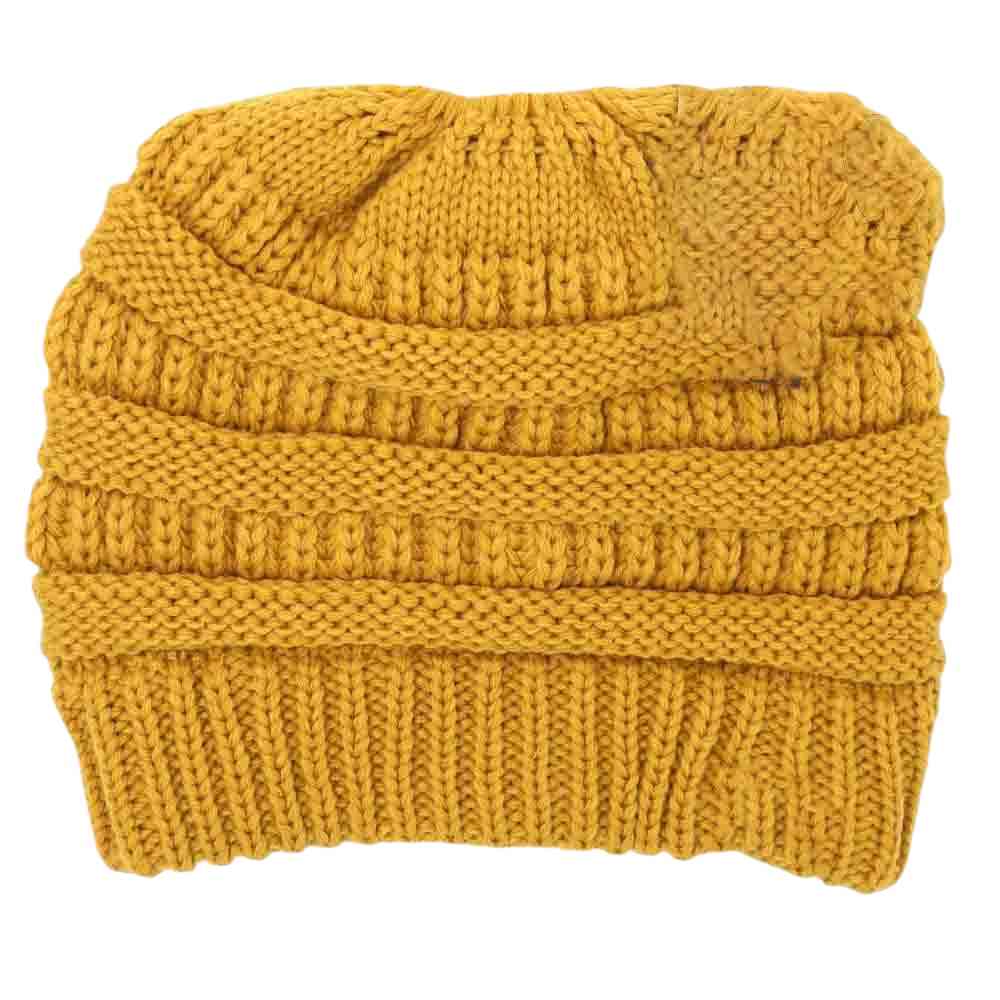 Mustard Solid Classic CC Beanie Tail combines timeless style with functional warmth. Crafted from soft, durable fabric, this beanie offers reliable comfort during colder months. Its classic design ensures versatile wear, while the extended tail detail adds a unique twist, making it an excellent choice for stylishly protecting your head and ears from chill. Perfect for everyday use, it pairs seamlessly with various outfits to keep you cozy in expert fashion.