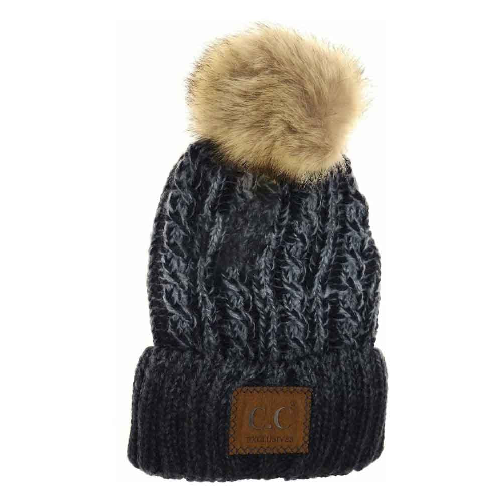 Navy The Two-Tone Ombre Vintage Faux Fur Pom Beanie blends classic style with contemporary design through its subtle ombre shading and plush faux fur pom. Crafted for warmth and comfort, this beanie offers superior insulation, making it an essential accessory for colder seasons. Its vintage-inspired look adds refined character while ensuring durability and softness for everyday wear. Ideal for those who value both elegance and practical cold-weather protection.