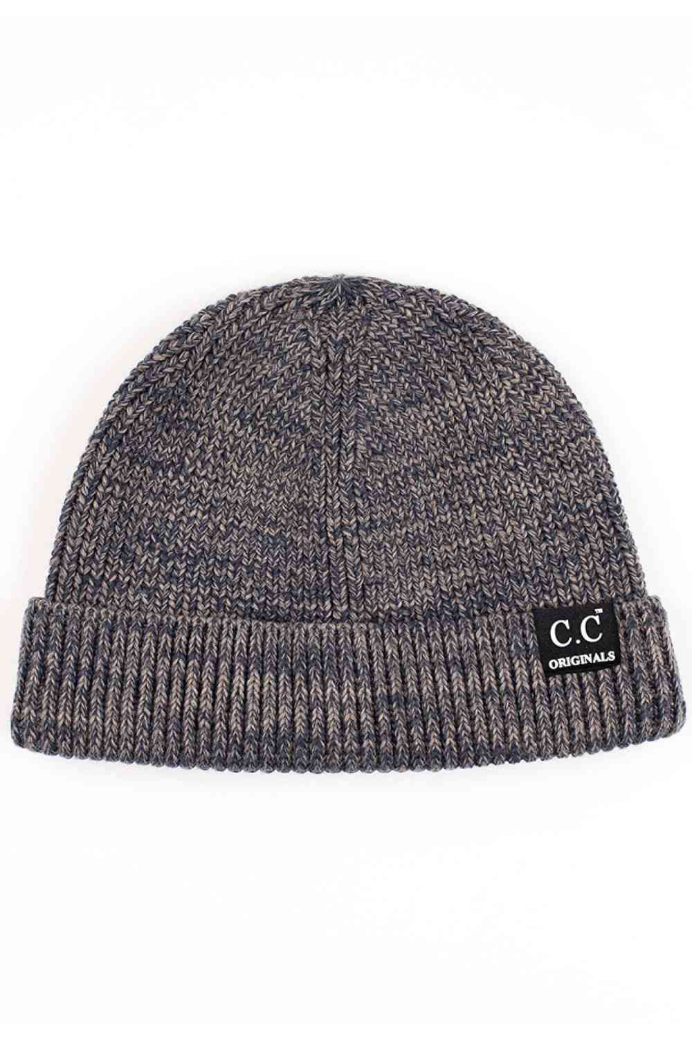Navy The C.C Mixed Tone Short Beanie combines comfort and style with its thoughtfully blended fabric of 45% cotton and 55% acrylic. This versatile beanie delivers warmth without bulk, making it ideal for layering through transitional seasons and everyday wear. The mixed-tone construction adds visual interest while remaining neutral enough to coordinate with any outfit. 