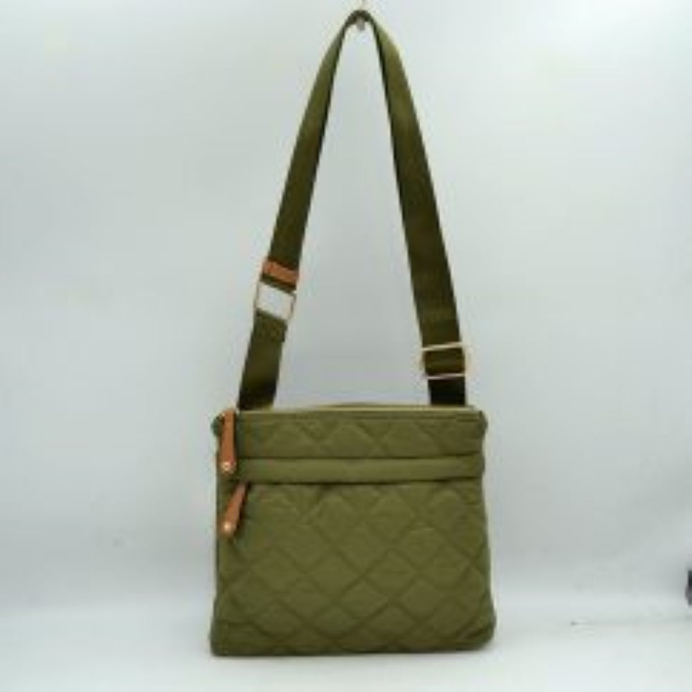 Olive This functional messenger bag presents a classic diamond-quilted pattern across its main body, making it a reliable option for organized everyday use. It features a secure top zipper closure that opens to the primary storage compartment, complemented by a secondary horizontal zippered pocket on the front panel for quick-access items. Distinctive contrast tabs with metallic studs detail the zipper pulls
