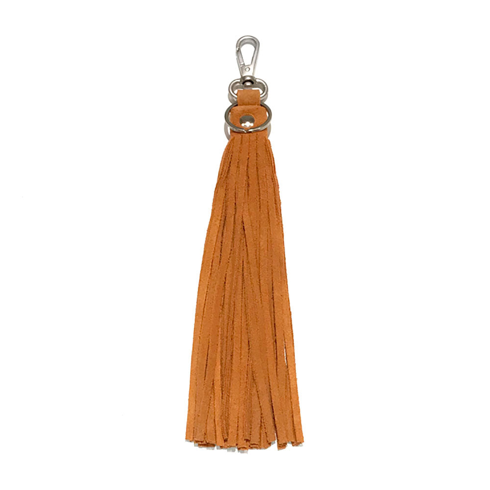 Orange Genuine Leather Tassel Bag Charm adds a touch of luxury to any bag. Made from high-quality leather, it is durable and stylish. Its classic design will elevate any handbag or backpack, and its versatility allows easy customization and personalization. Add a chic touch to your bag today.