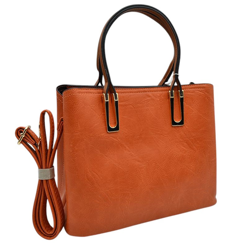 Orange Solid Faux Leather Tote Bag Shoulder Bag, is perfect for the modern woman. Crafted with genuine faux leather, this stylish bag is durable, light, and spacious, and with adjustable straps, it is perfect for everyday use. Its sleek design will have you turning heads wherever you go.