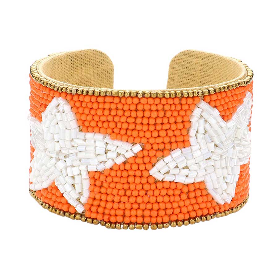 Orange White This Game Day Beaded Star Accented Cuff Bracelet adds a stylish touch to any ensemble. The beaded star accents on the cuff give it a unique, eye-catching design, perfect for game day or any day. Wear it to show your support for your favorite team - you're sure to stand out from the crowd.
