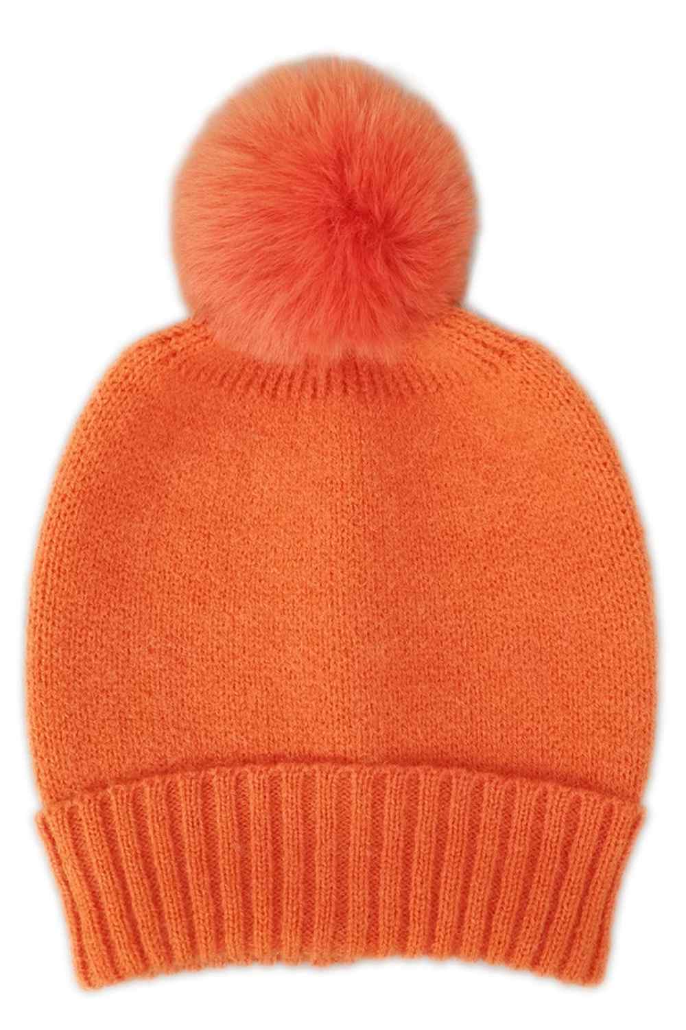 Orange The Solid Color Knit Beanie with Pom features a simple, timeless knit design topped with a playful pom for a stylish winter look. Made from soft, stretchy fabric, it provides cozy warmth and a comfortable fit for everyday cold-weather wear.