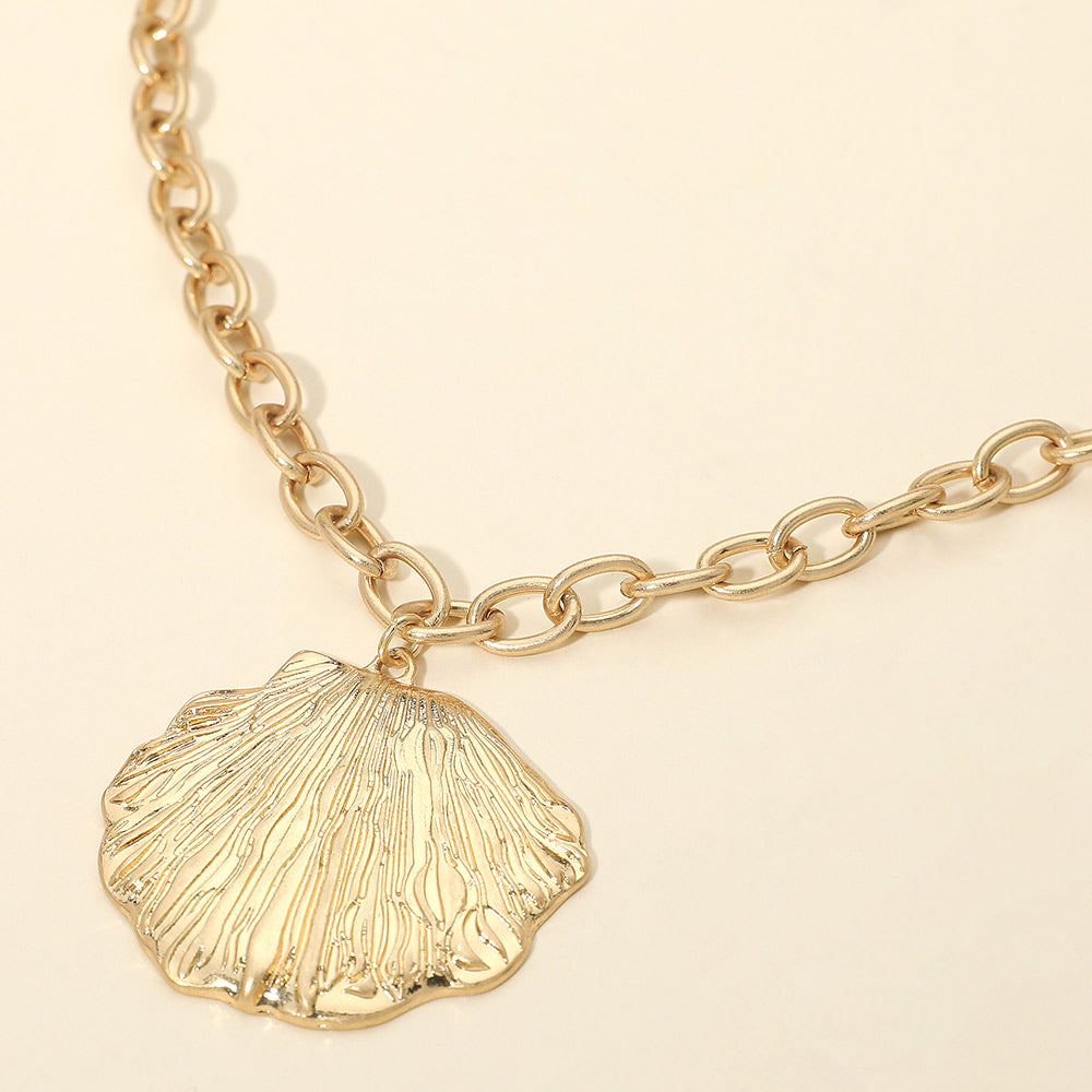 Madeline Love Worn Gold Textured Metal Seashell Pendant Necklace - Necklaces