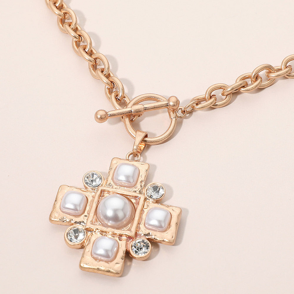 Madeline Love Cream, Worn Gold Pearl Accent Stone Detail Cross Toggle Pendant Statement Necklace