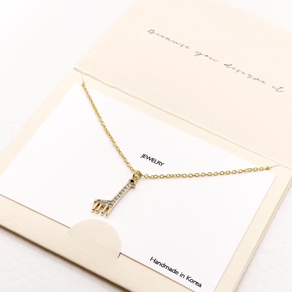 Madeline Love Gold Rhinestone Embellished Metal Giraffe Pendant Necklace - Jewelry