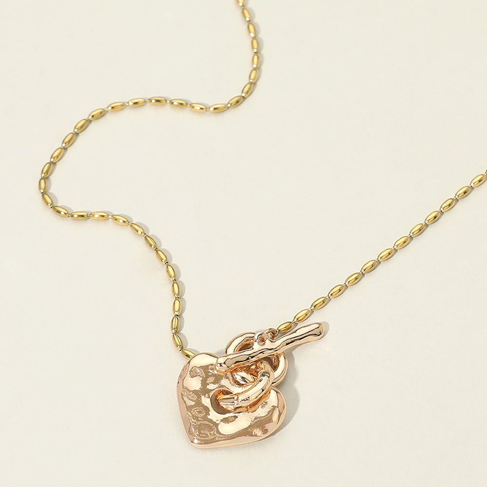 Madeline Love Gold Hammered Metal Heart Toggle Necklace - Necklaces