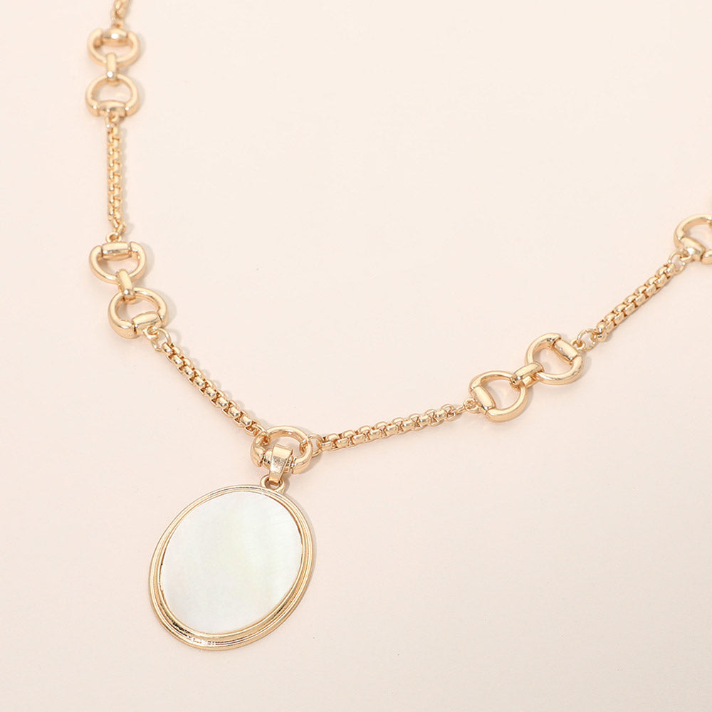 Madeline Love Worn Gold Mother of Pearl Oval Pendant Horsebit Link Chain Necklace