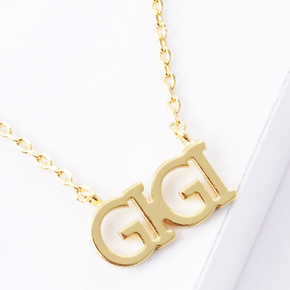 Madeline Love Gold GIGI Gold Dipped Metal Message Pendant Necklace - Necklaces