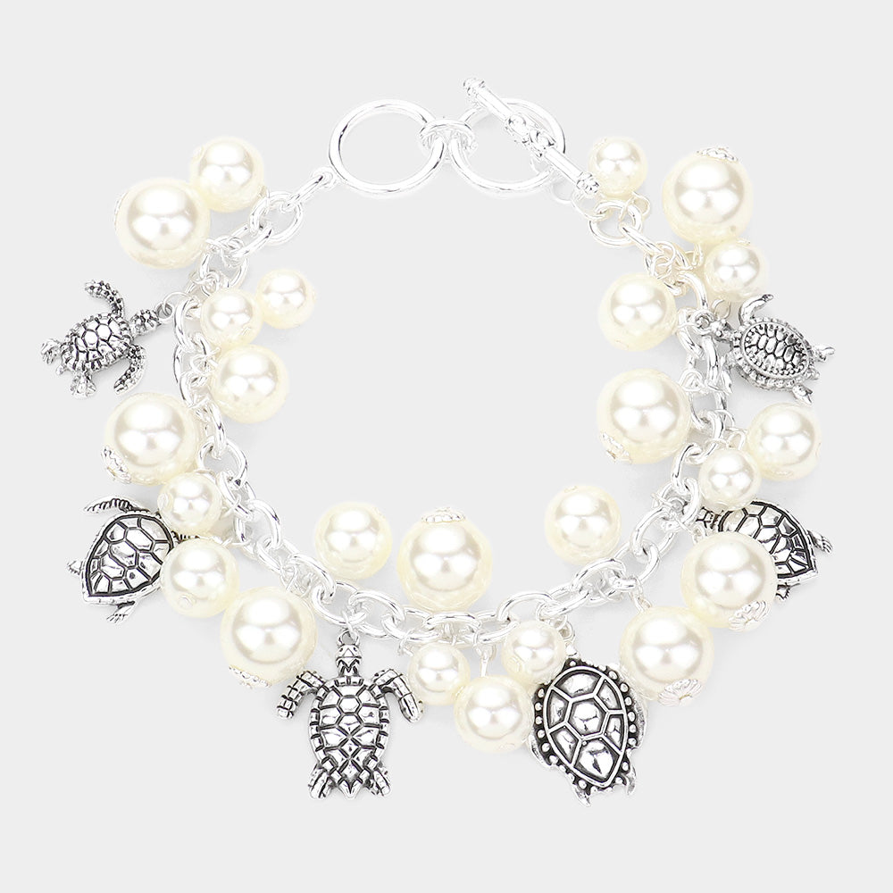 Madeline Love Antique Silver, Cream Antique Metal Turtle Charm Station Pearl Toggle Bracelet - Bracelets