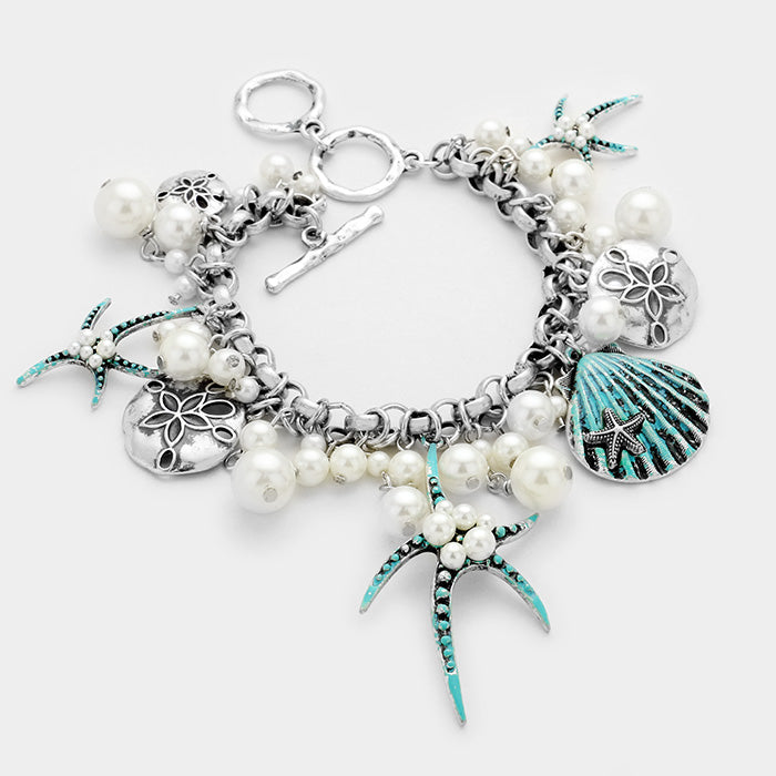 Patina Verdigris, Silver Burnished Pearl embellished starfish shell multi charm toggle bracelet
