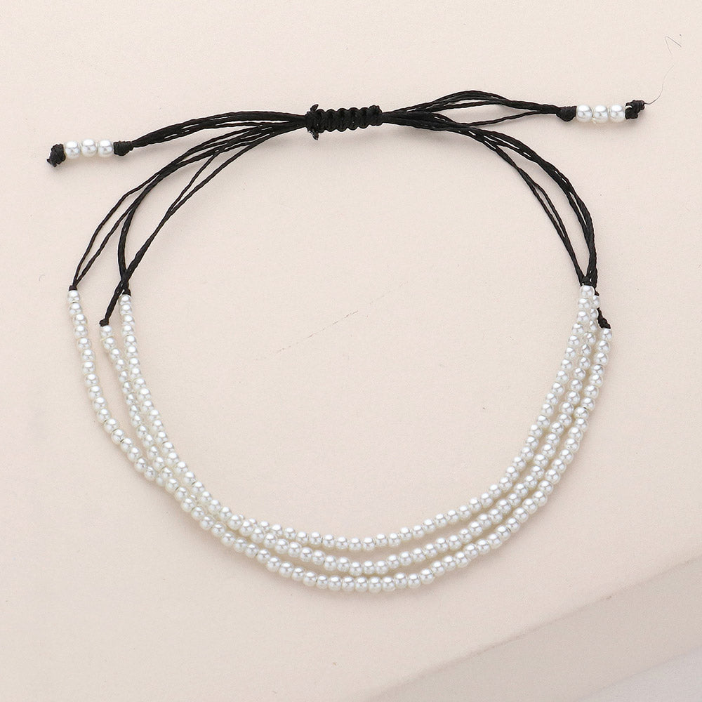Madeline Love Black, Cream Seed Pearl Beaded Triple Layered Cinch Pull Tie Bracelet - Bracelets
