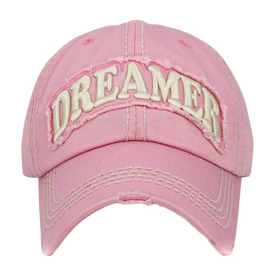 Pink Dreamer Message Vintage Baseball Cap, is crafted from durable cotton twill. It features an adjustable strap with an antique brass buckle for a snug fit and a unique vintage look. The bold printed message displays the wearer's commitment to their dream. Get the perfect fit and stylish look with this one-of-a-kind cap.