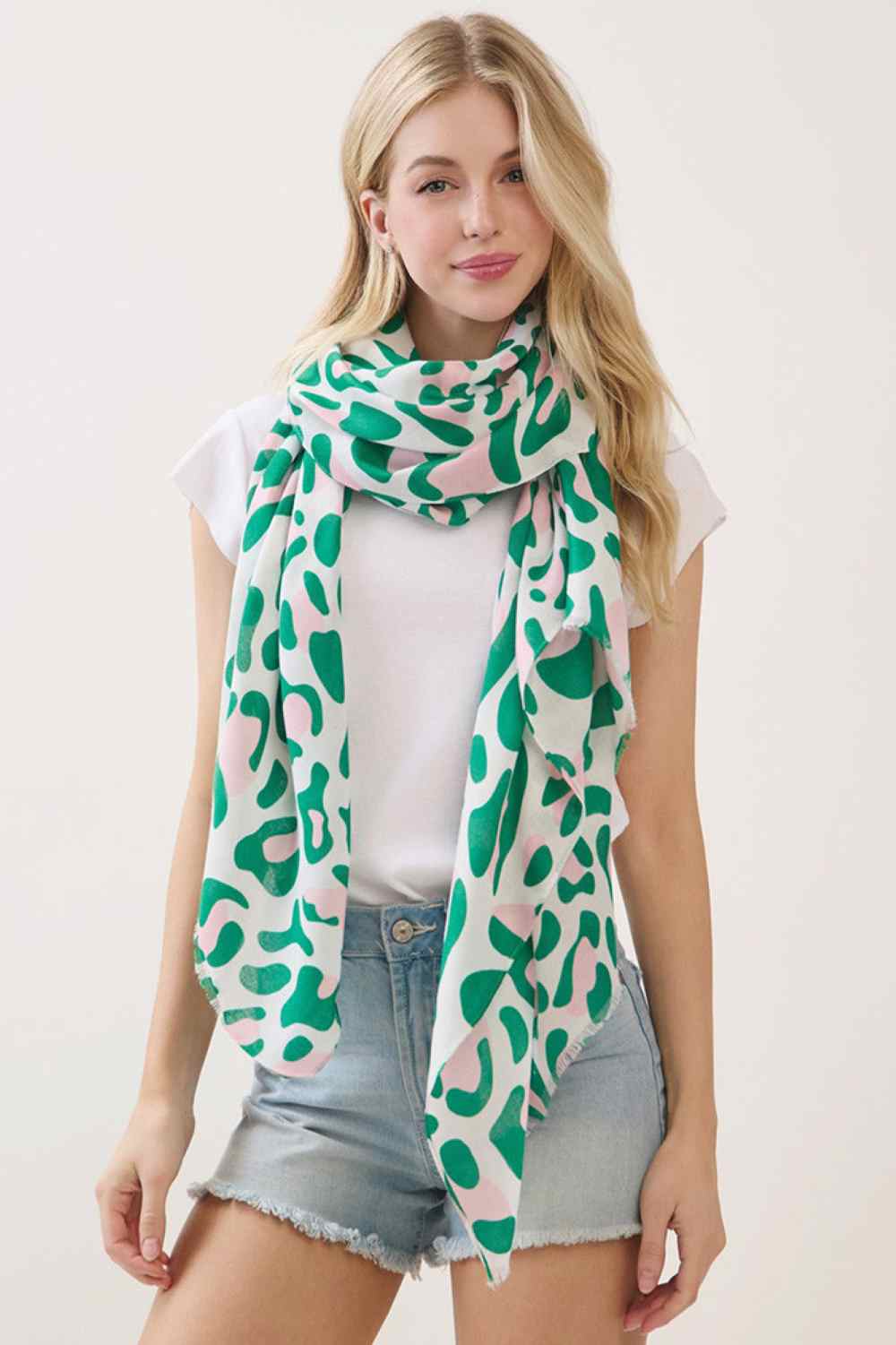 Pink Elevate your accessory game with this striking Leopard Pattern Print Oblong Scarf. Featuring a bold, timeless leopard print design, this versatile piece measures 35" x 70", making it perfect for draping, wrapping, or styling however you choose. Crafted from 100% polyester, it's lightweight, durable, and easy to care for. Whether you're layering for warmth or adding a pop of wild sophistication to your outfit, this scarf delivers effortless style. A must-have staple for any fashion-forward wardrobe.