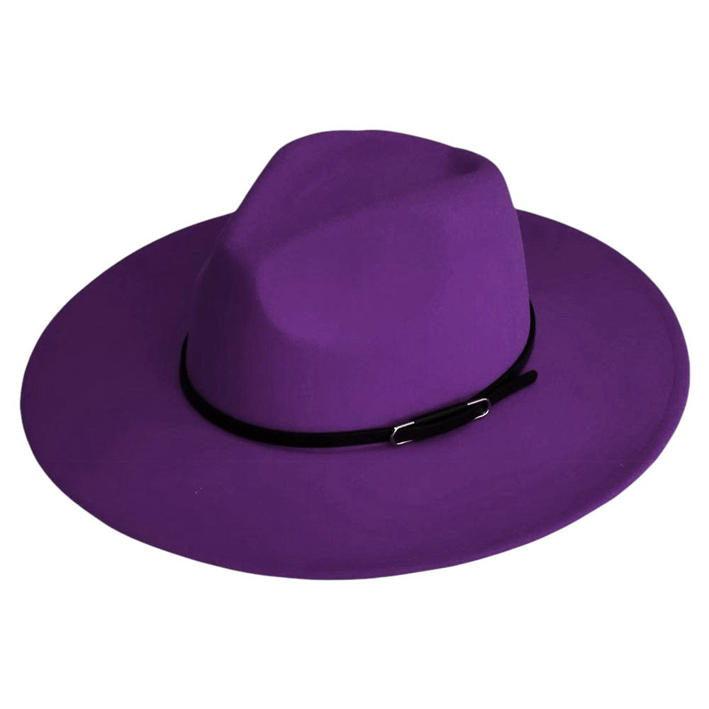 Purple Faux Leather Band Solid Panama Hat is a stylish and versatile accessory. Crafted with high-quality materials, it features a faux leather band that adds a touch of sophistication to the classic Panama hat design. With its lightweight and breathable construction, this hat is perfect for any occasion, providing both style and comfort. Elevate your wardrobe with this timeless piece.