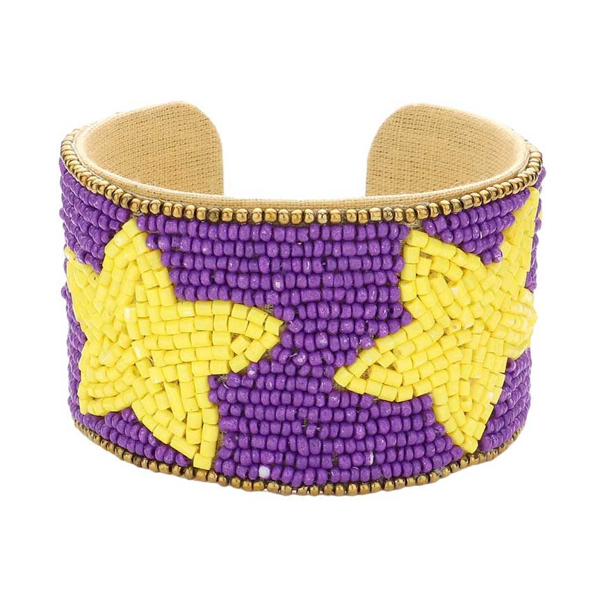 Purple Yellow This Game Day Beaded Star Accented Cuff Bracelet adds a stylish touch to any ensemble. The beaded star accents on the cuff give it a unique, eye-catching design, perfect for game day or any day. Wear it to show your support for your favorite team - you're sure to stand out from the crowd.