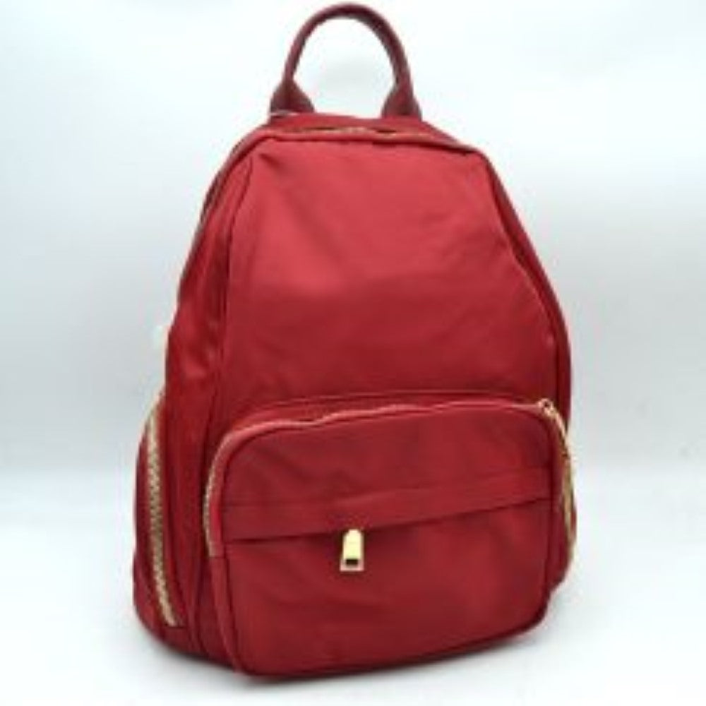 Red This practical backpack features a smooth, streamlined exterior designed for active everyday use. It offers ample storage compartments, including a spacious main section with a top curved zipper and a prominent front zippered pouch accented by a small metallic square detail. For added organization, matching zippered side pockets line the lower edges of the bag. The design is completed with a smooth top loop handle for quick carrying