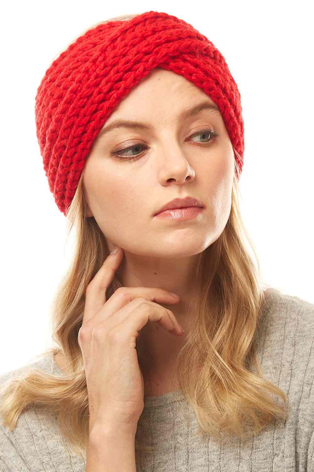 Red Stay warm and stylish with this Solid Twisted Knit Headband. Crafted from soft 100% acrylic, it features a classic twisted knit design that adds texture and visual interest. The generous 4" x 9.8" dimensions provide comfortable coverage for your ears and forehead. Perfect for chilly days, outdoor activities, or casual everyday wear. Lightweight and easy to care for, this versatile headband pairs effortlessly with any winter wardrobe.