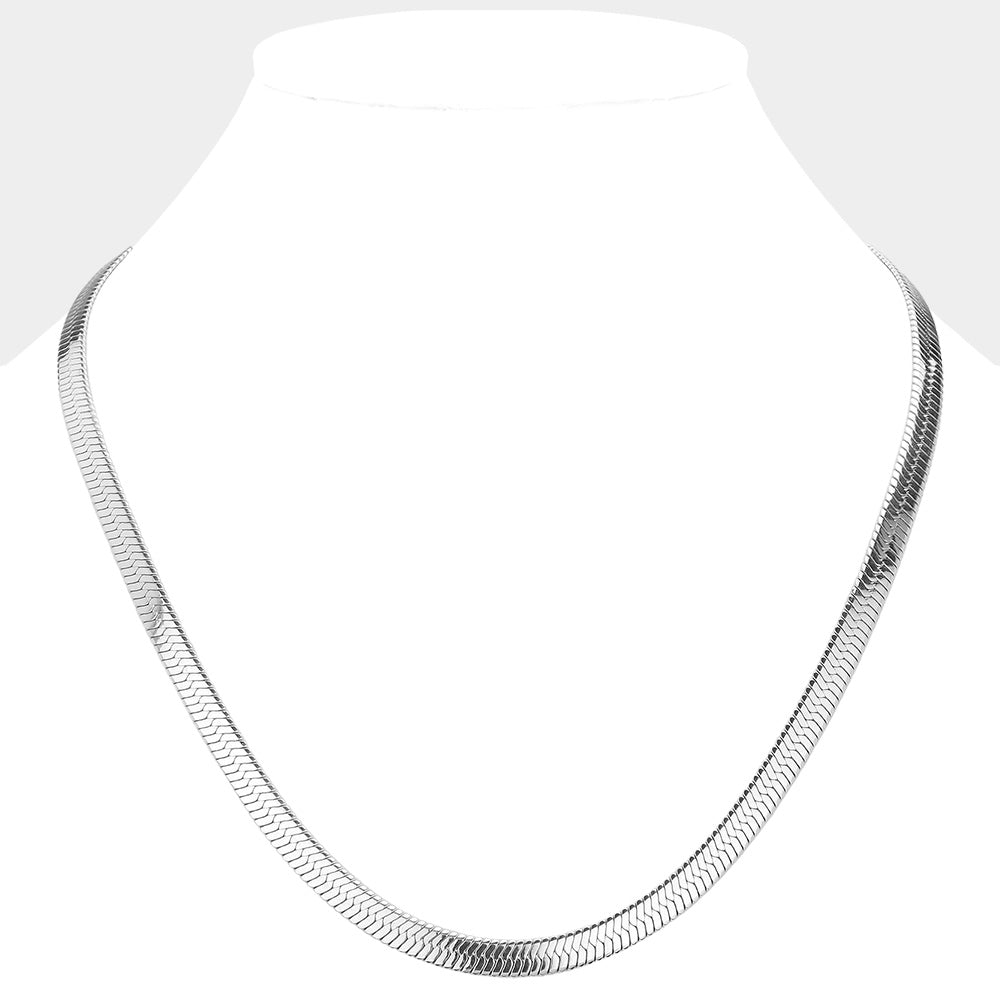 Rhodium 20-inch, 6mm Stainless Steel Herringbone Chain Necklace is a versatile and durable accessory. Crafted from high-quality stainless steel, it offers a sleek and modern look that will elevate any outfit. With its secure and sturdy clasp, it's the perfect accessory for everyday wear or special occasions.