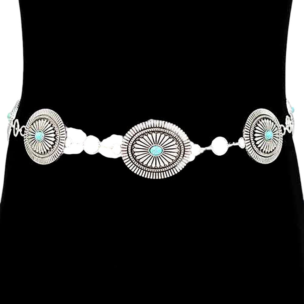 Rhodium Boho Vintage Western Turquoise Stone Pointed Concho Chain Belt is a versatile accessory for any bohemian or western-inspired outfit. The stunning turquoise stones and intricate pointed conchos add a unique vintage touch to your look. The chain design allows for an adjustable fit and adds an edgy element to your ensemble. Complete your outfit with this must-have boho belt.