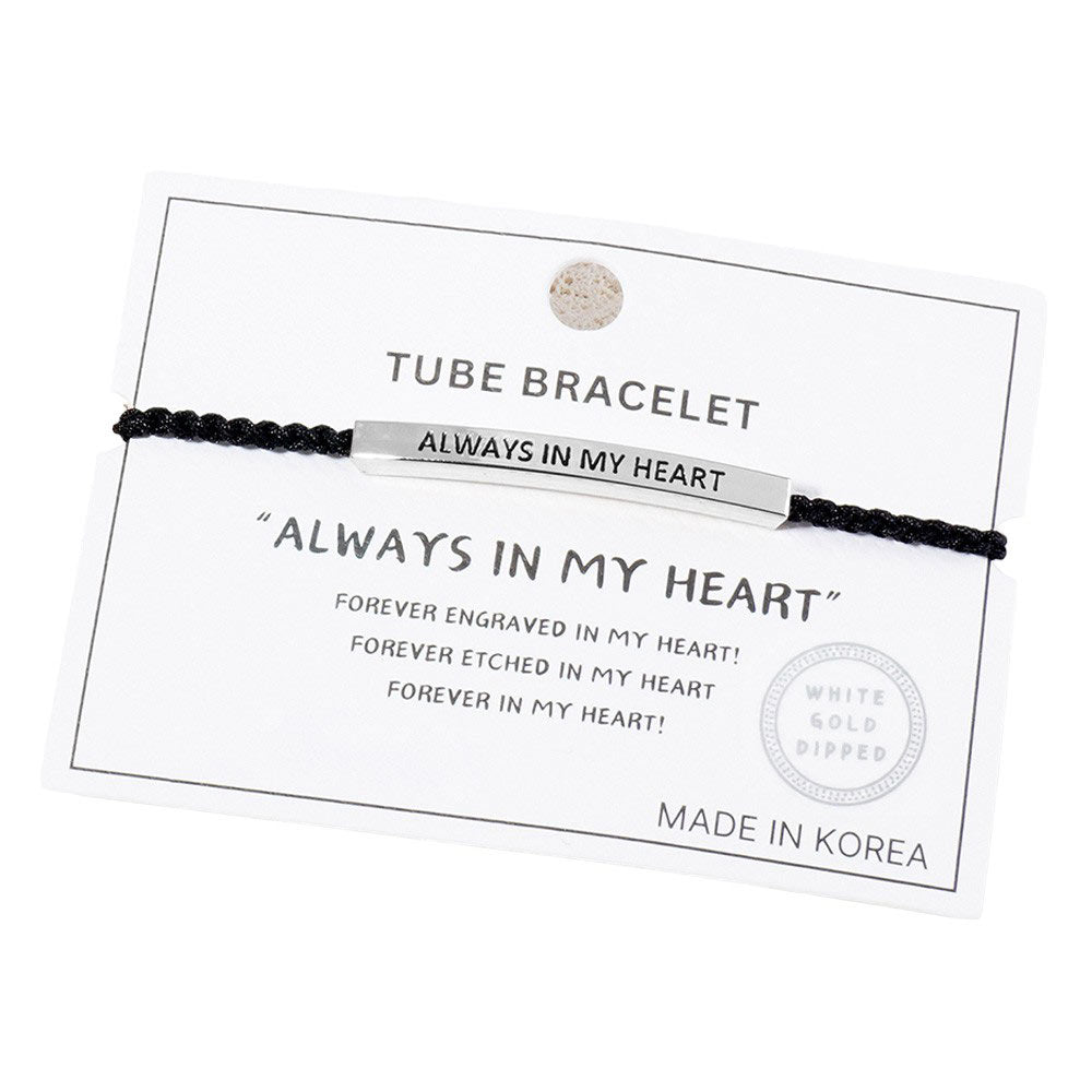 Rhodium-Gold-Dipped ALWYAS IN MY HEART Message Bar Pointed Rope Adjustable Cinch Pull Tie Bracelet is expertly crafted with a pointed design and adjustable rope for comfort and durability. With its meaningful message, this bracelet serves as a reminder of your unwavering persistence and dedication.