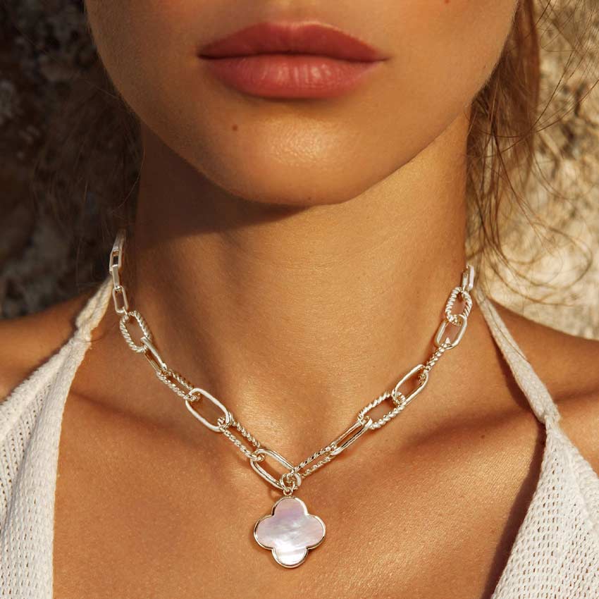 Rhodium Gold Dipped Mother Of Pearl Quatrefoil Pendant Necklace, turn your neck into a chic fashion statement with this mother-of-pearl pendant necklace! The beautifully crafted design adds a gorgeous glow to any outfit. Perfect Birthday Gift, Anniversary Gift, Mother's Day Gif, or any meaningful occasion.