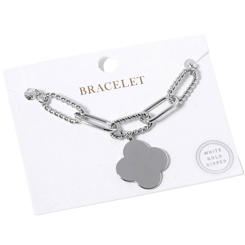 Rhodium Gold Dipped Quatrefoil Charm Bracelet, features a beautiful gold plating. The quatrefoil charm compliments the bracelet perfectly adding a distinct touch of style. This bracelet is the perfect accessory for any formal or special occasion. Perfect gift for birthdays, Valentine's Day, anniversaries, or any special day.