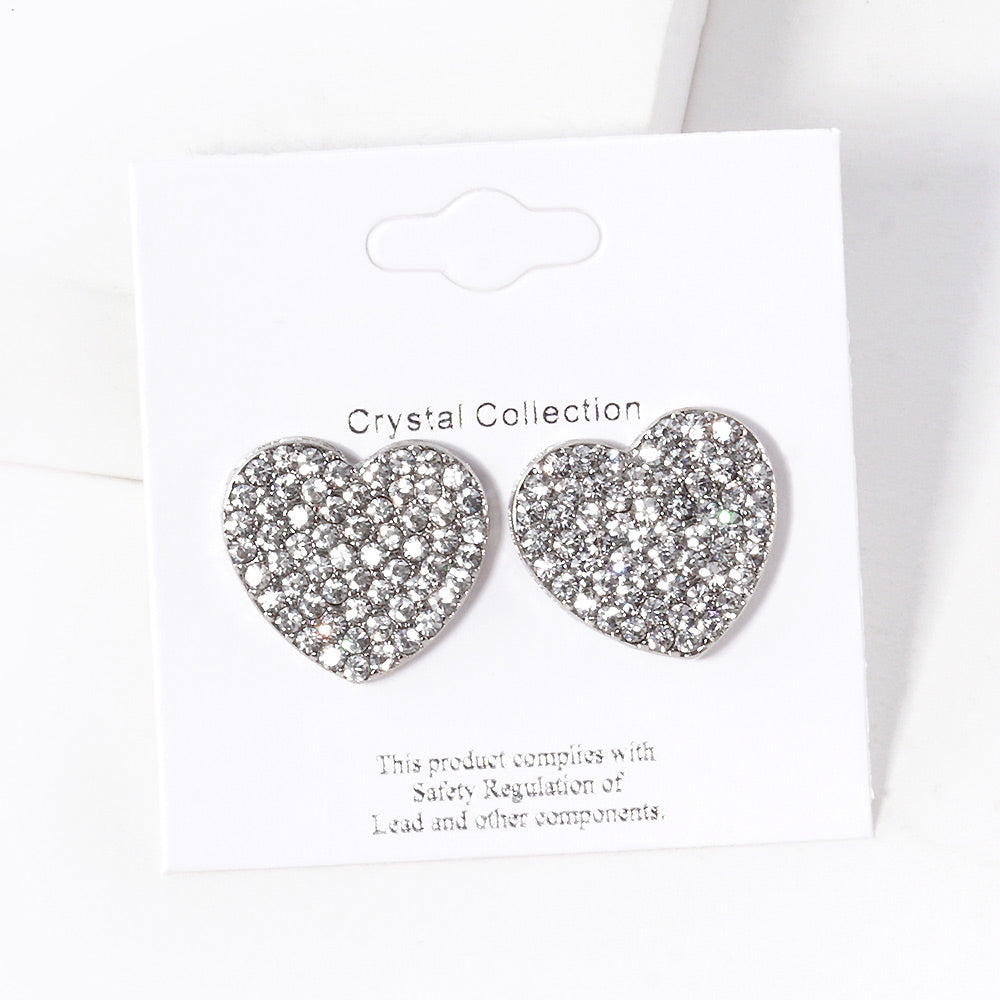 Clear-Rhodium-Crystal Stone Paved Heart Stud Earrings feature a sparkling design that adds a touch of elegance to any outfit. Crafted with expert precision and quality materials, these earrings are perfect for any occasion. The heart-shaped studs are encrusted with shimmering crystals, making them a stunning addition to any jewelry collection.
