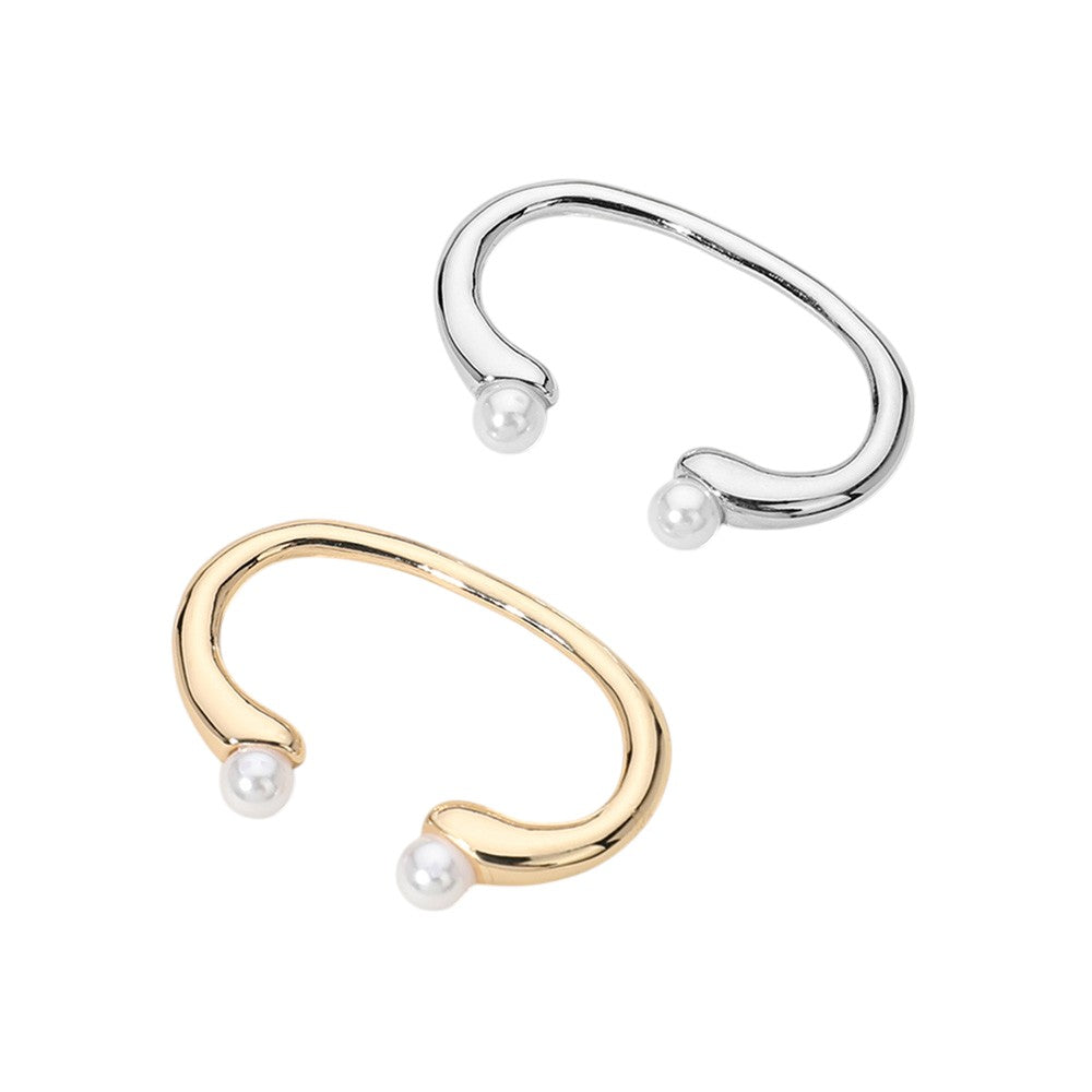 Gold SECRET BOX_14K Gold Dipped Pearl Tip Two Finger Ring is a stunning and unique piece of jewelry. The 14K gold plating adds a touch of luxury, while the pearl tip and two finger design make it a stand-out accessory. Elevate your style and make a statement with this exquisite ring.