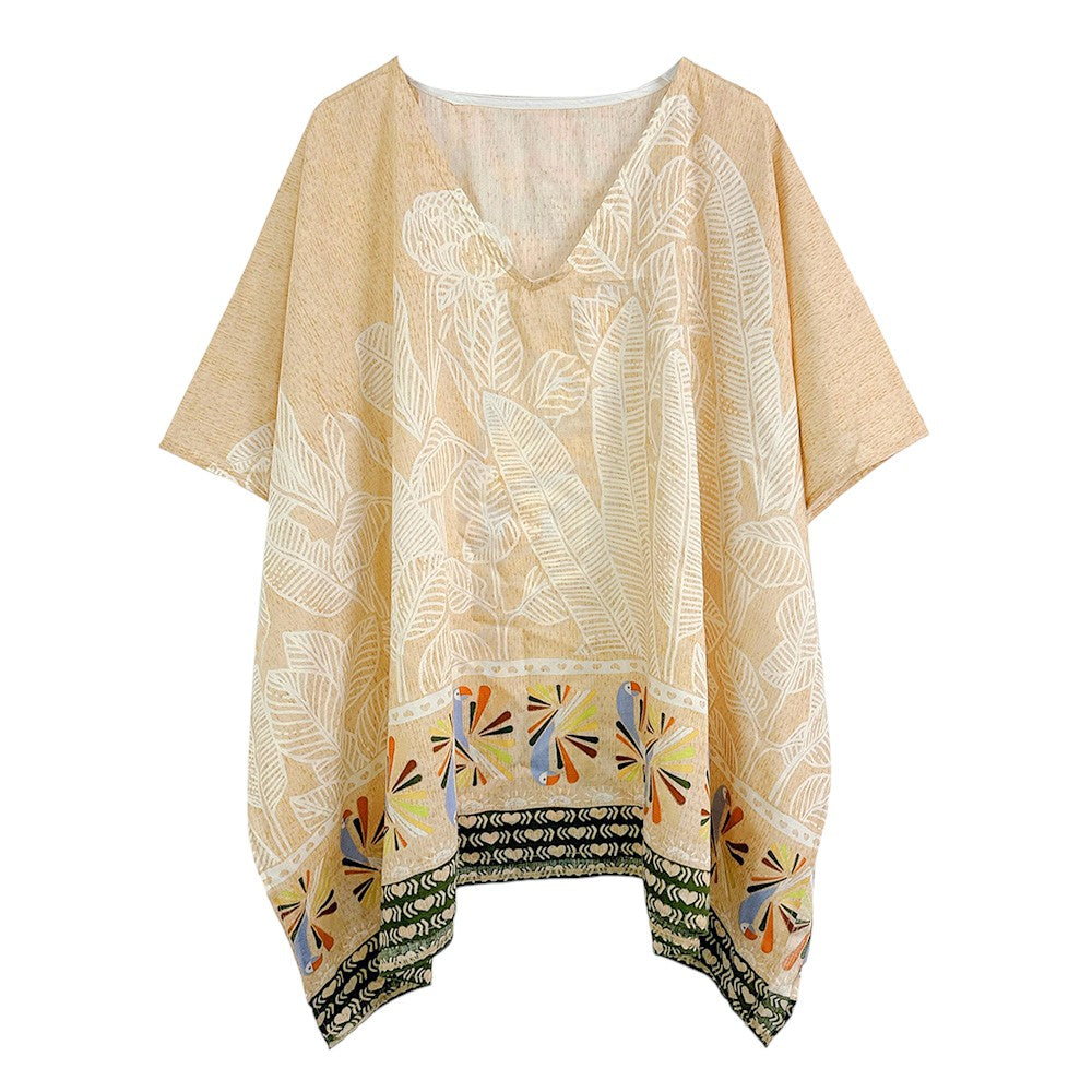 Tan Leaf Print Cover Up Poncho is the perfect addition to your summer wardrobe. Made from lightweight fabric, it is both stylish and functional, providing coverage from the sun while keeping you cool. The leaf print adds a touch of nature-inspired elegance to any beach or pool ensemble.