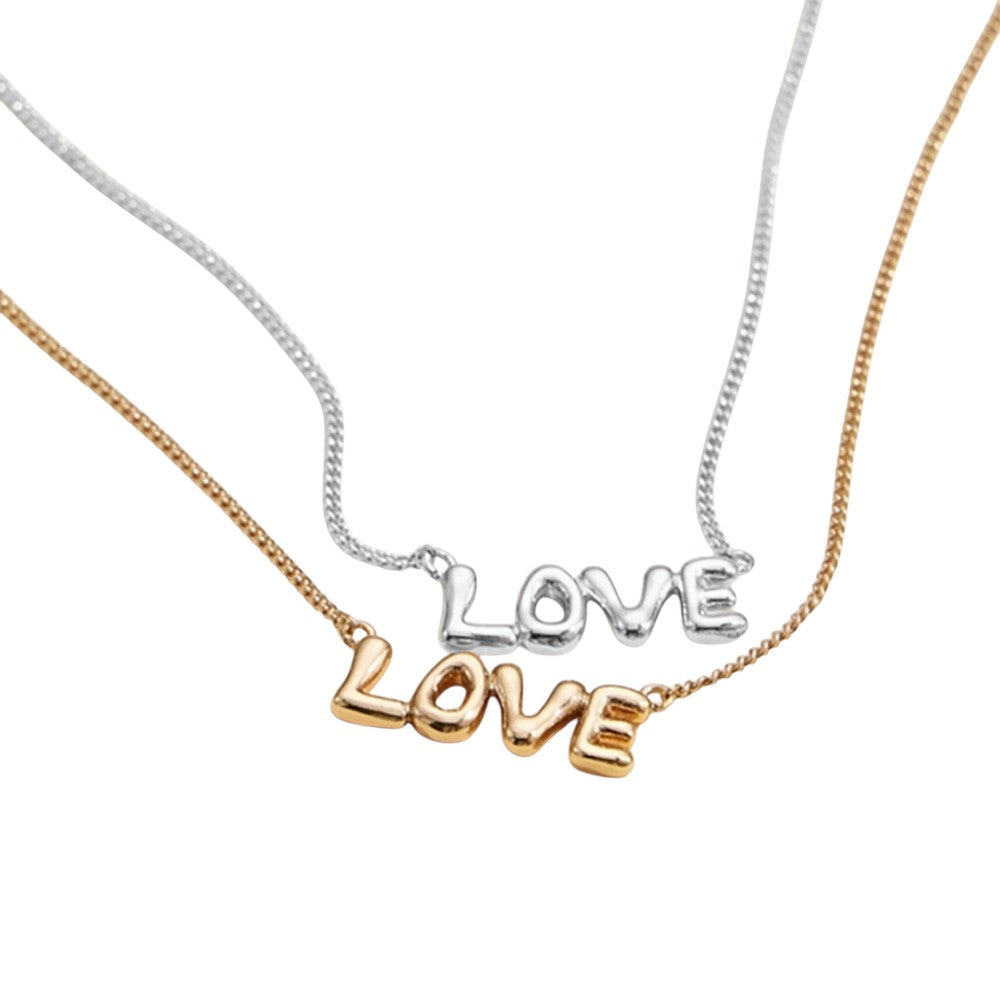Semi Fine Collection presents a stunning 18K gold dipped brass metal necklace featuring a LOVE message pendant. This necklace adds a touch of sophistication and elegance to any outfit, making it a perfect addition to any jewelry collection. Show your love with this timeless piece.
