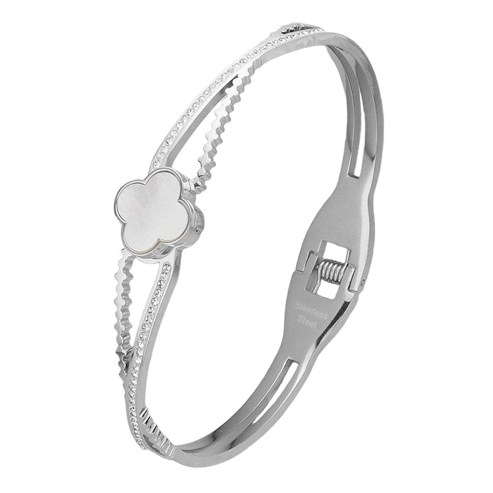 Silver Mother Of Pearl Stone Paved Stainless Steel Hinged Bangle Bracelet adds a touch of elegance to any outfit. The shimmering mother-of-pearl stones are intricately paved on a durable stainless steel hinged bangle, providing both style and durability. Elevate your jewelry collection with this stunning piece.