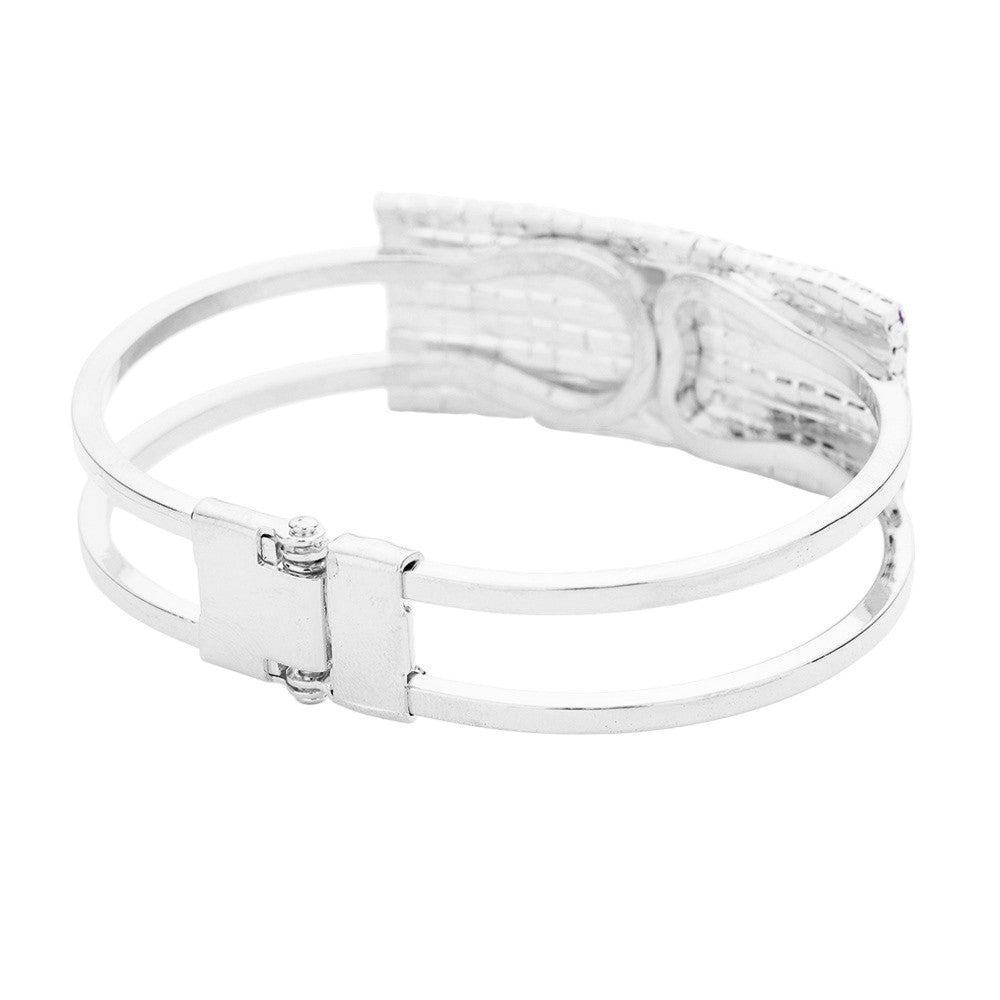 Silver Multi Crystal Pave American Flag Hinged Bracelet showcases expert craftsmanship with stunning crystal pave detailing and a hinged design for easy wear. Made with precision and quality materials, this bracelet is a luxurious addition to any ensemble. Show your patriotism and elevate your style with this elegant bracelet.