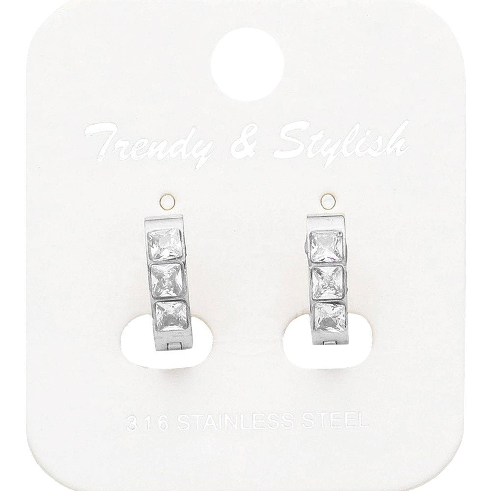 Silver Square CZ Stone Paved Stainless Steel Huggie Hoop Earrings offer a stylish and sophisticated look. The square CZ stones add a touch of elegance, while the stainless steel material provides durability and hypoallergenic properties. Perfect for any occasion, these earrings are a must-have for any jewelry collection.