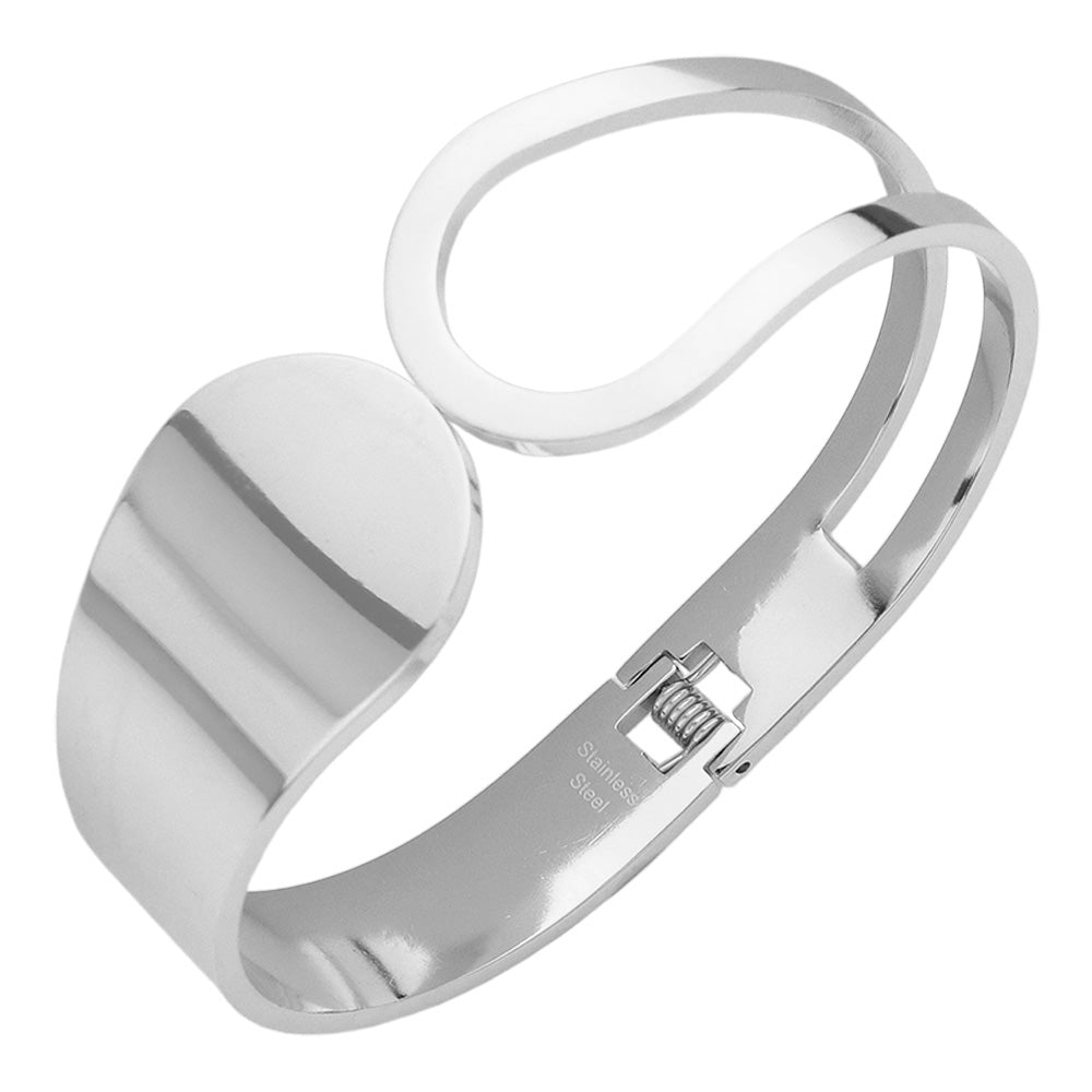 Silver Stainless Steel Abstract Hinged Bangle Bracelet features a beautiful and modern abstract design. Crafted with high-quality stainless steel, it is durable and resistant to corrosion. The hinged closure provides a secure and comfortable fit. Elevate your style with this unique and timeless bracelet.