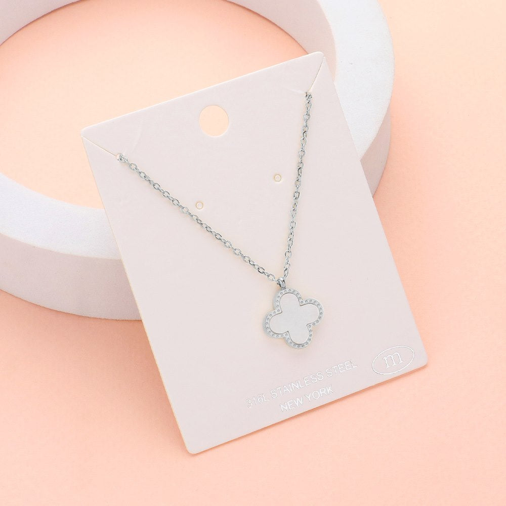 Silver Stainless steel necklace features a stunning mother-of-pearl quatrefoil pendant, adding a touch of elegance to any outfit. The durable stainless steel construction ensures long-lasting wear, making it a perfect addition to your jewelry collection. Elevate your style with this timeless piece.