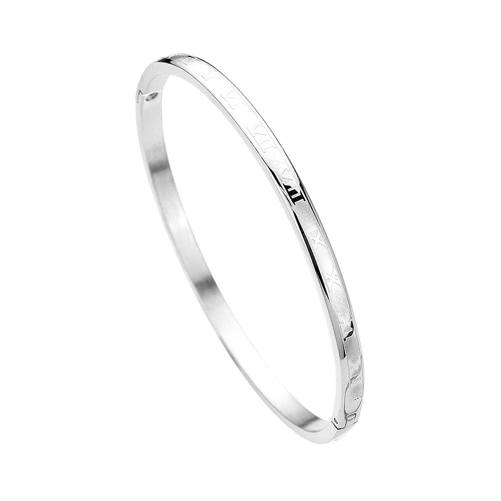 Silver Stainless Steel Roman Numerals Hinged Bangle Bracelet combines timeless style with durable materials. Crafted from stainless steel, this bracelet features Roman numerals for a classic touch. The hinged design allows for easy on and off, making it the perfect accessory for any outfit.