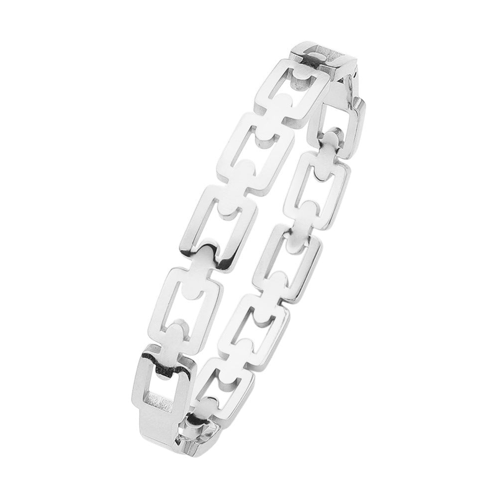 Silver Stainless steel square chain hinged bangle bracelet is a sleek and durable addition to any collection. Made from high-quality stainless steel, this bracelet offers both style and strength. The hinged design allows for easy wear and a comfortable fit, making it perfect for everyday wear or special occasions. Experience the sophistication and versatility of this timeless piece.