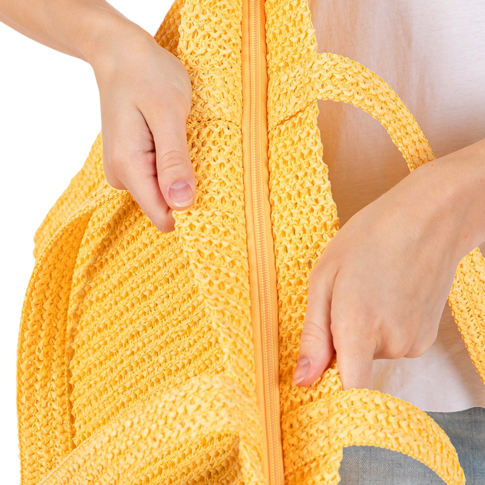 Yellow Solid Crochet Straw Tote Bag is perfect for a day at the beach. Made from durable straw material, it features a spacious interior and sturdy handles for carrying all your essentials. Stay stylish and organized with this must-have accessory.