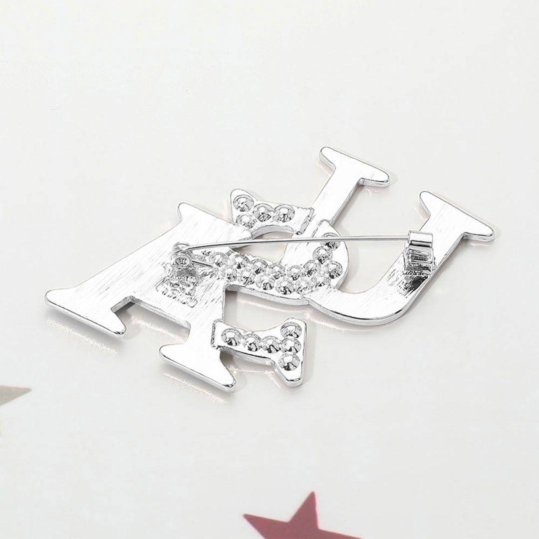 Rodhium Add a bold patriotic accent to your look with this Stone Paved Enamel USA Pin Brooch, featuring vibrant enamel detailing and stone-paved accents for a refined finish. Perfect for jackets, bags, hats, or lapels, it offers a durable, eye-catching design that showcases American pride in a stylish way.